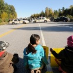 Children hold signs during a highway blockade in northern Quebec by the Algonquins of Barriere Lake. Photo: Charles Mostoller